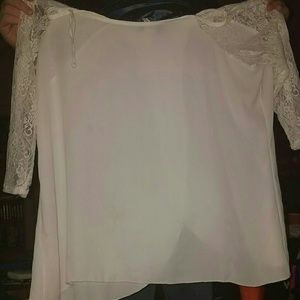 deb
White Lace arms and split back very cute
